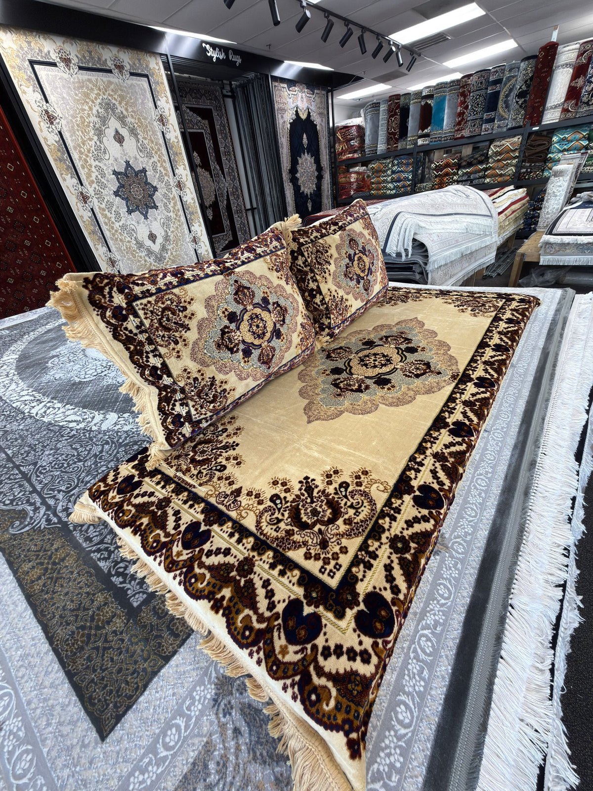 Detail of the large central medallion on the cream and brown Afghan toshak cover