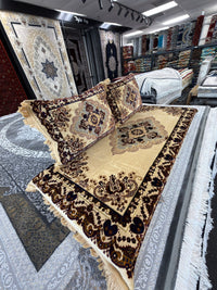 Detail of the large central medallion on the cream and brown Afghan toshak cover
