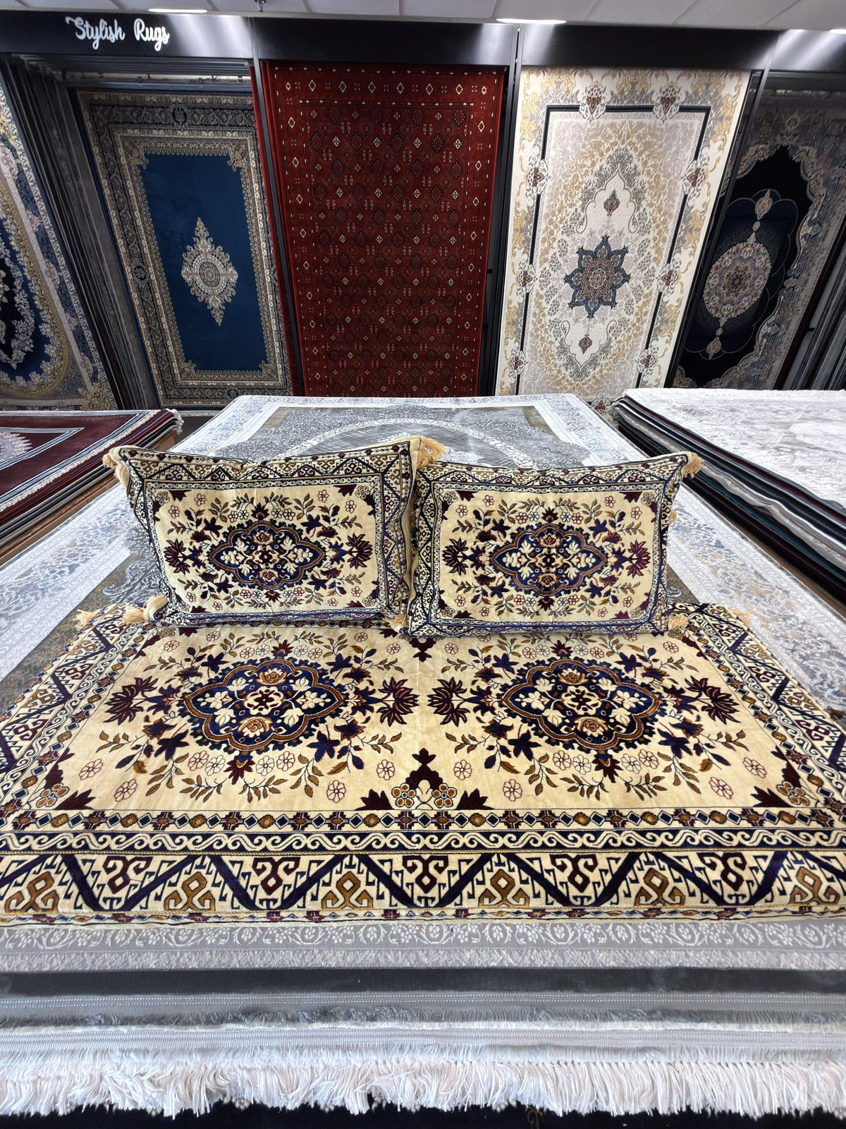 Cream and navy kilim-border Afghan toshak cover set with two matching cushions
