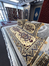 Cream and navy kilim-border Afghan toshak cover set, angled view