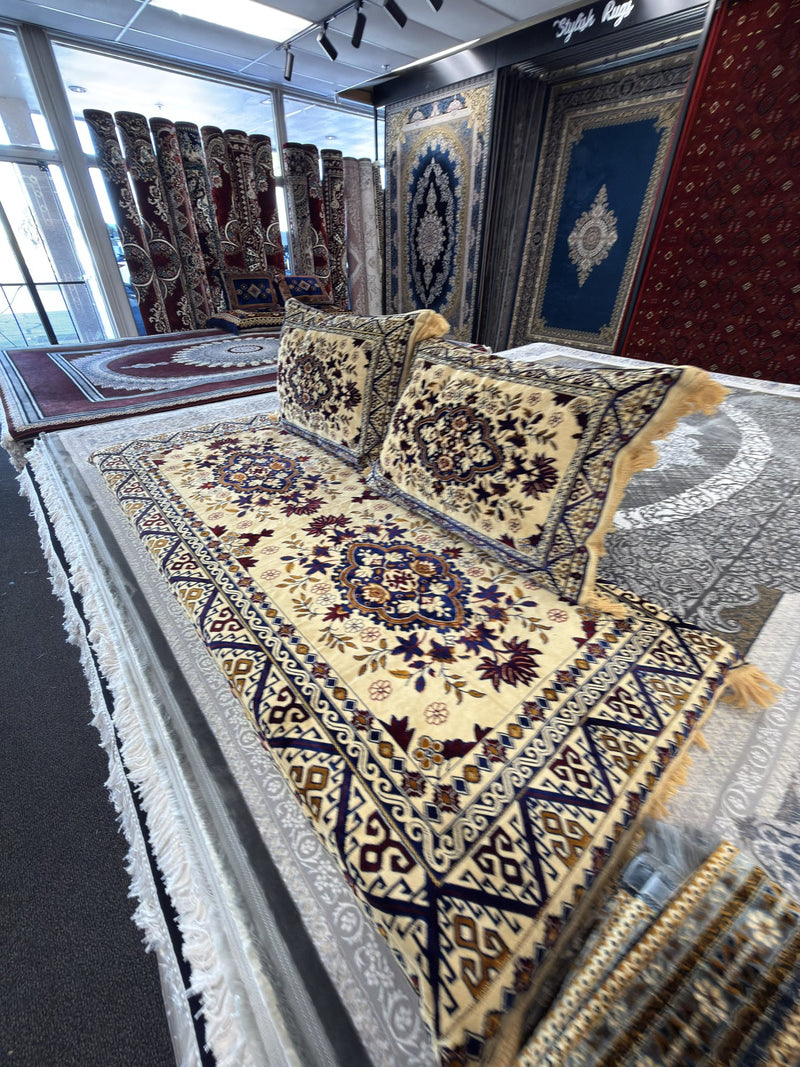Cream and navy kilim-border Afghan toshak cover set with two matching cushions