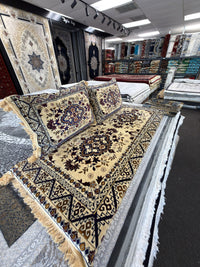 Cream and navy kilim-border Afghan toshak cover set in the Sacramento showroom
