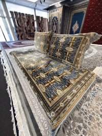 Grey and gold panel Afghan toshak cover set, angled view